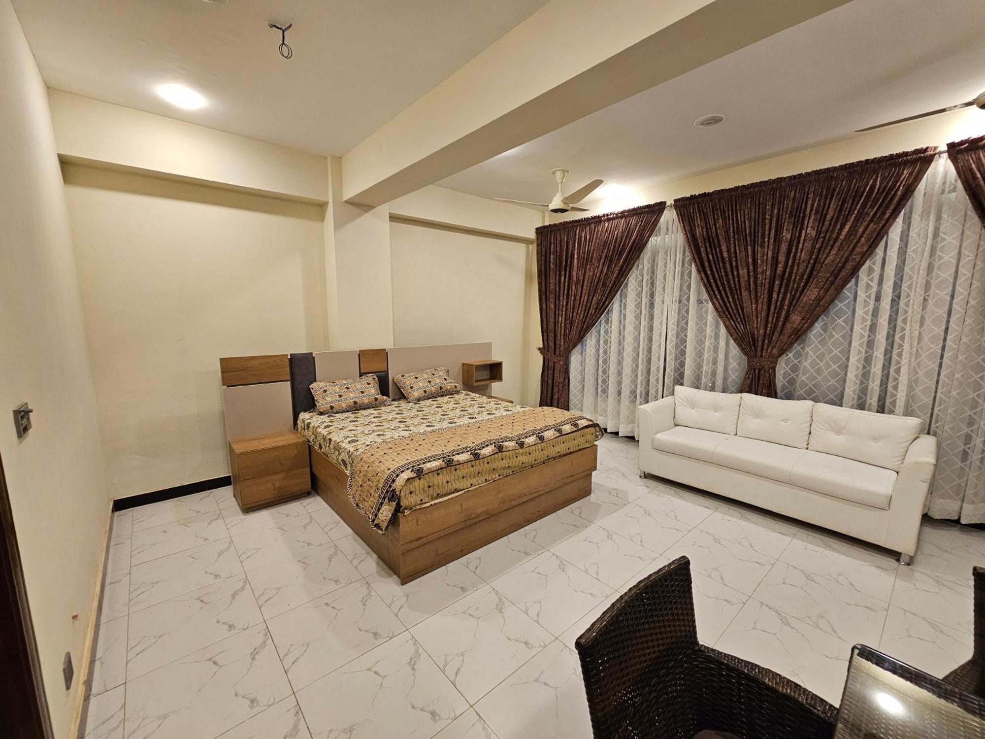 Motorway Majesty Suites Islamabad - Near Islamabad International Airport And Motorway ภายนอก รูปภาพ